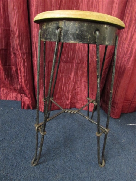 RUSTIC SCULPTED METAL STOOL WITH WOODEN SEAT