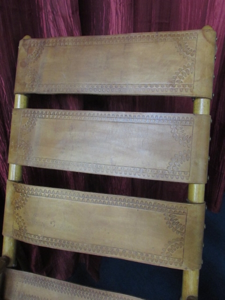 FOLDING ROCKING CHAIR WITH WESTERN STYLE TOOLED LEATHER.