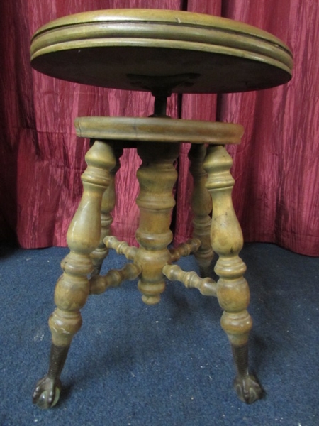 ANTIQUE PIANO STOOL WITH GLASS CLAW FEET.