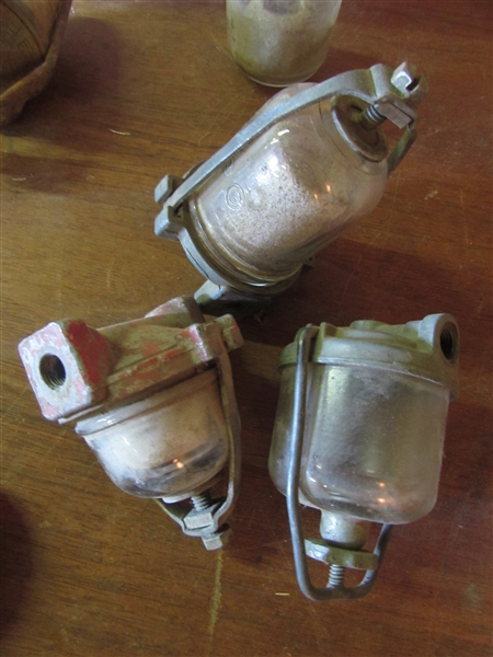 SEVERAL GLASS FUEL BOWLS AND PARTS