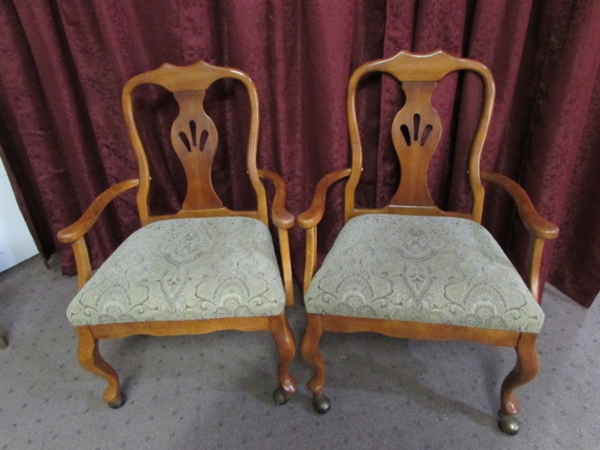 ANOTHER PAIR OF ROLLING DINING ROOM CHAIRS