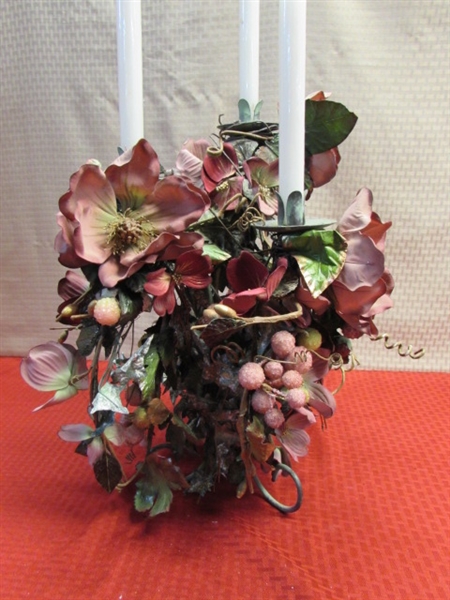 3 CANDLE CENTERPIECE TASTEFULLY DECORATED WITH MAUVE FLOWERS AND GRAPES