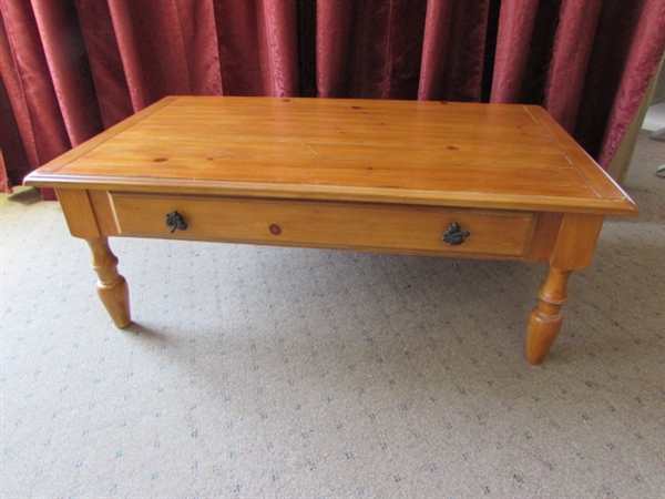 HARD WOOD COFFEE TABLE WITH OAK LEAF ACCENTS