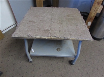 METAL TABLE WITH CASTERS