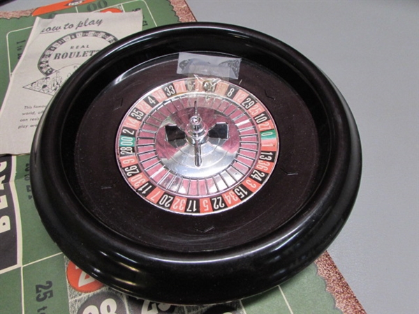 VINTAGE POKER CHIPS AND SMALL ROULETTE WHEEL