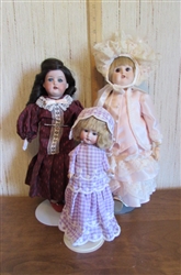 VTG/ANTIQUE PORCELAIN DOLLS WITH PAINTED TEETH
