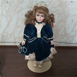 17" PORCELAIN DOLL WITH STAND