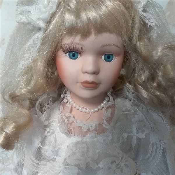 16 PORCELAIN DOLL WITH STAND