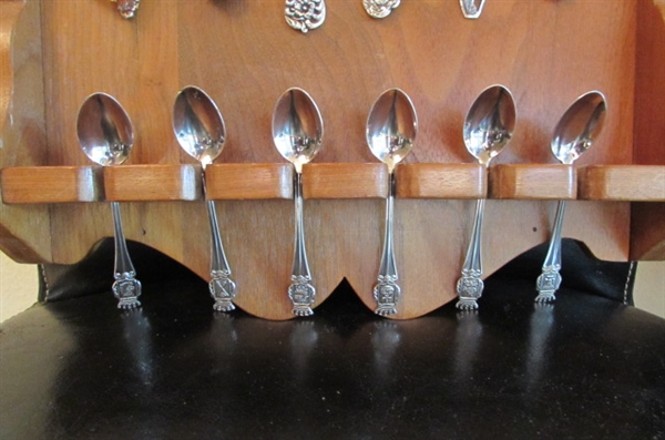 COLLECTION OF STERLING SILVER & SILVER PLATE SOUVENIR SPOONS WITH 18 SLOT WOODEN DISPLAY