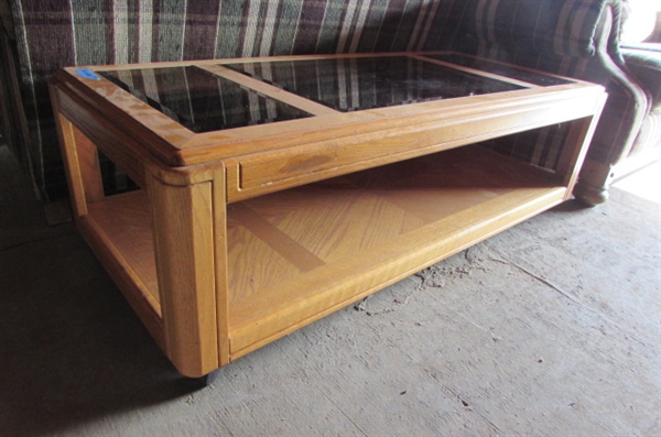 SOLID OAK COFFEE TABLE WITH BEVELED SMOKE GLASS INSERTS *LOCATED AT ESTATE*