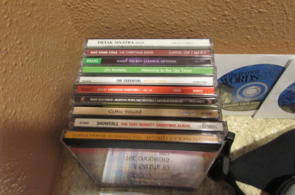 COBY DIGITAL CD PLAYER, CASE, HEADPHONES & CDS