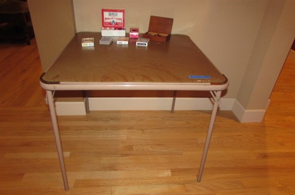 VINTAGE SAMSONITE CARD TABLE WITH PLAYING CARDS AND POKER CHIPS