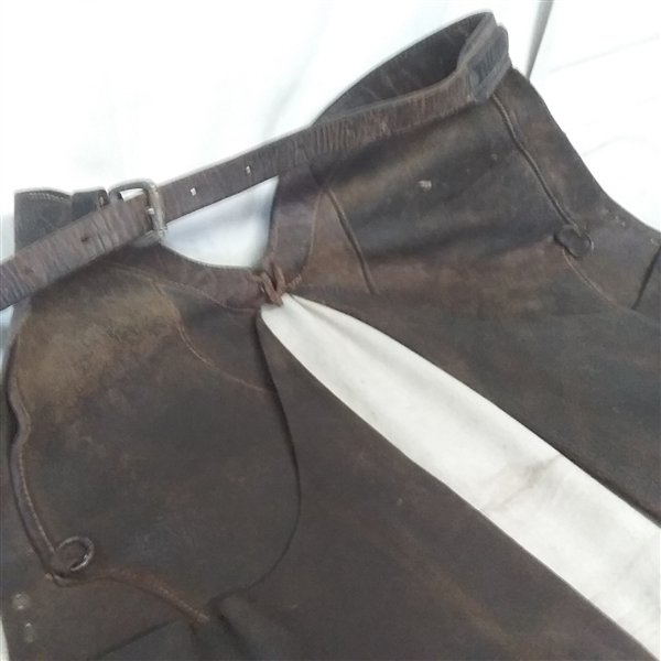 VINTAGE LEATHER CHAPS WITH BRASS EMBELLISHMENTS