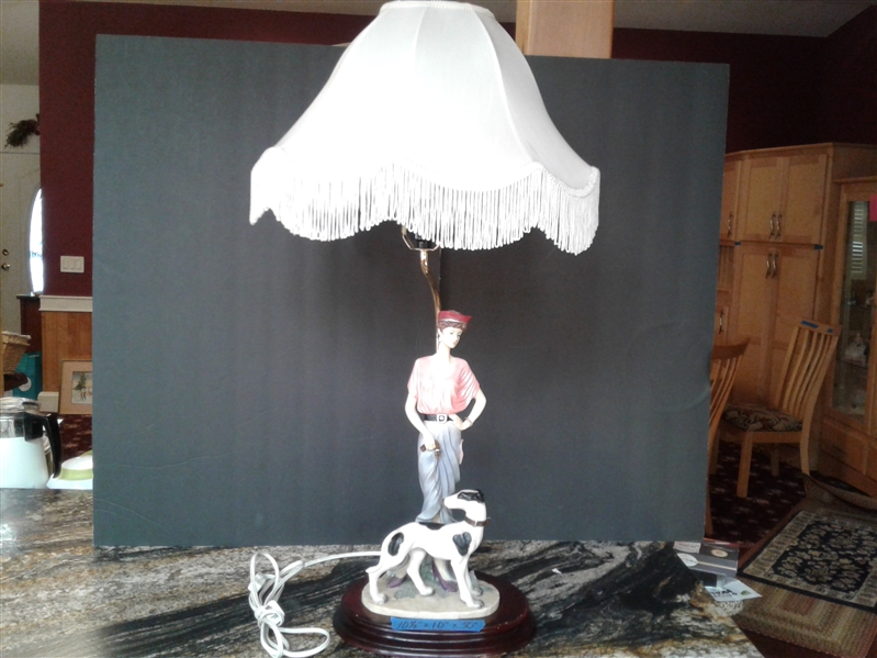 Lamp with Elegant Looking Lady Walking Her Dog 