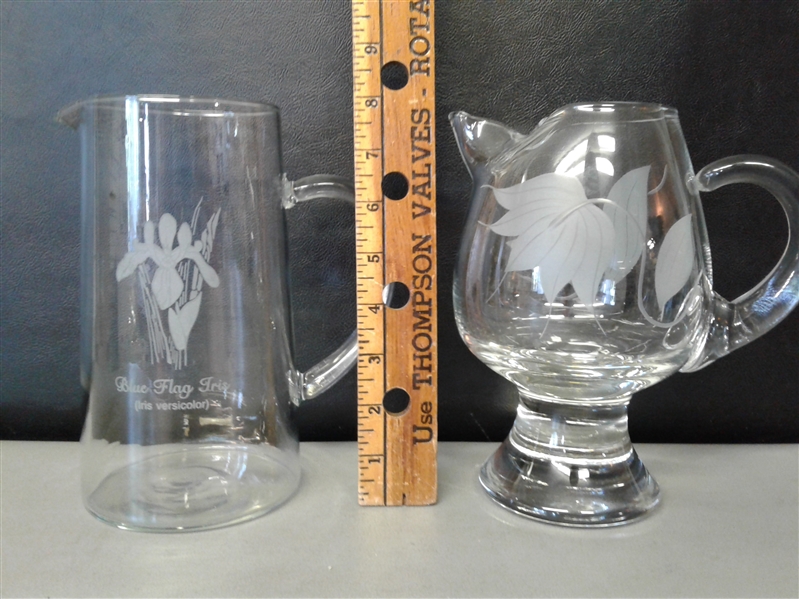 2 Etched Glass Pitchers