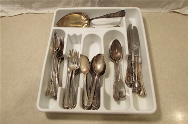 STERLING SILVER UTENSILS INCLUDING FORKS SPOONS KNIVES AND A SERVING SPATULA