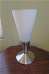 SILVER BOTTOM LAMP WITH WHITE SHADE HAS RED BULB