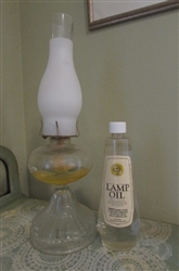 OIL LAMP AND BOTTLE OF LAMP OIL