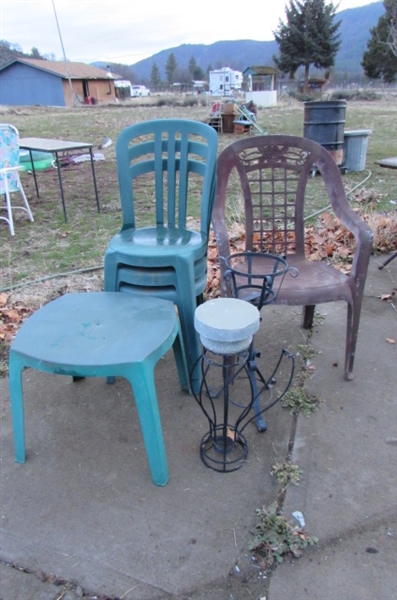GREEN PLASTIC BISTRO CHAIRS AND TABLE WITH PLANT STANDS