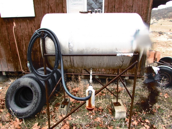 ALUMINUM FUEL TANK ON STAND W/HOSE