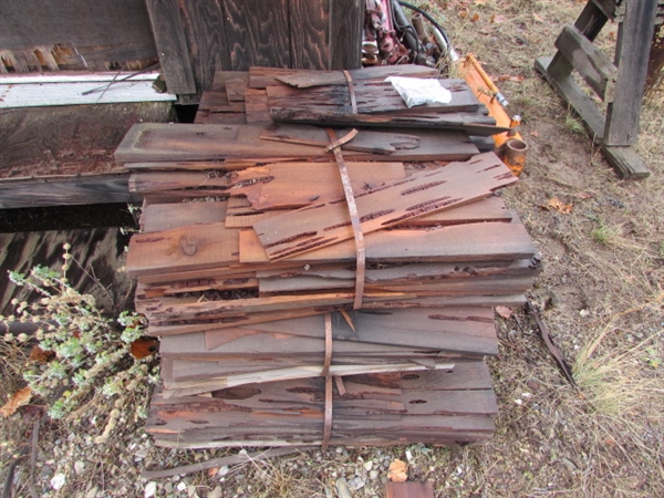 STACK OF CEDAR ROOFING SHAKES