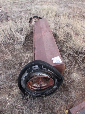 UNKNOWN IMPLEMENT PARTS ON AXLE