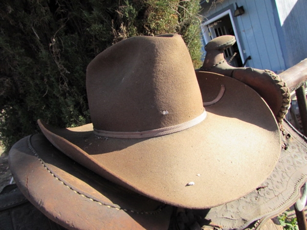 3 OLD WEATHERED SADDLES & COWBOY HATS
