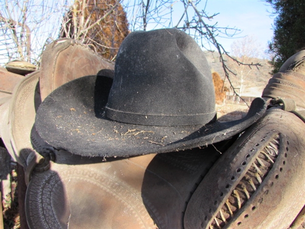 3 OLD WEATHERED SADDLES & COWBOY HATS