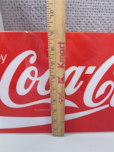 Coca-Cola Ads and Bags and Santa Apron.