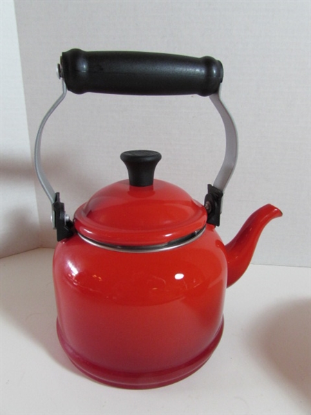 GOOD COOK BREAD PAN, RED LE CREUSET BAKEWARE AND TEA KETTLE.