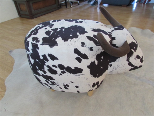 LARGE WHITE ANIMAL HIDE AND LITTLE COW FOOTSTOOL.