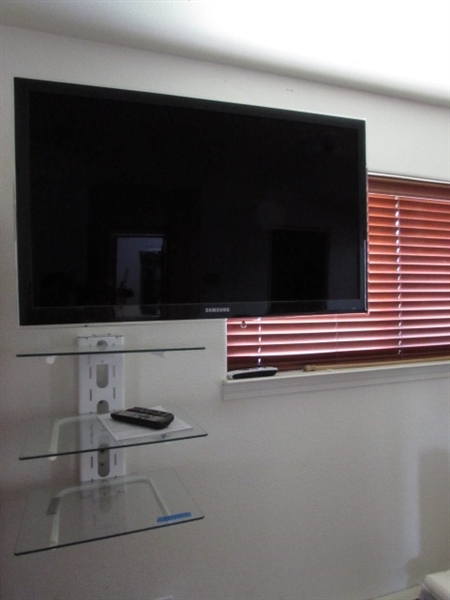 SAMSUNG 40.0 1080P LED HDTV , TV SANUS VISION MOUNT, AND GLASS SHELVING UNIT FOR ACCESSORIES.
