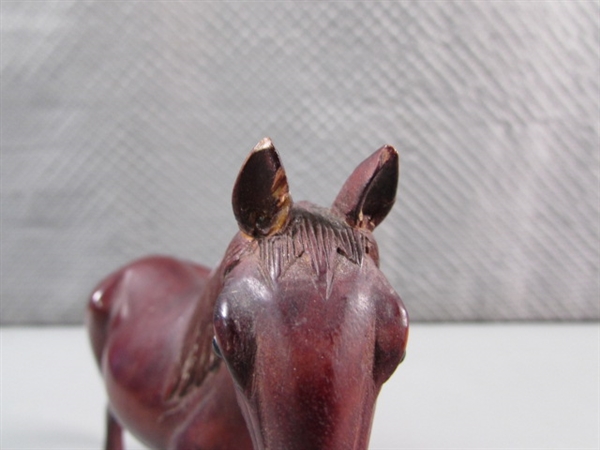 HAND CARVED WOODEN HORSE W/GLASS EYES ON STAND