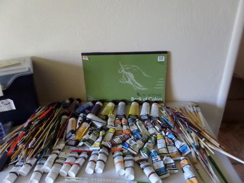 VARIETY OF ACRYLIC PAINTS, BRUSHES, PAINT PALLETS AND DID i MENTION BRUSHES?