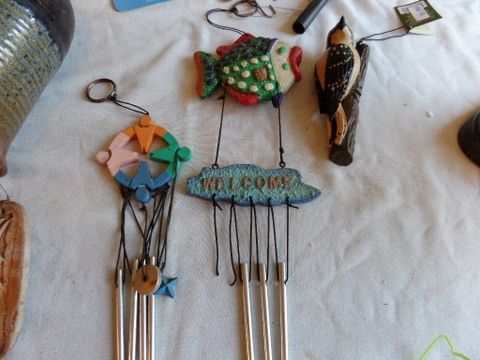 OVERSTUFFED BASKET FULL OF GARDENING SUPPLIES, FOLDING MINI BENCH, WIND CHIMES, BIRD HOUSE, POT LIFTERS