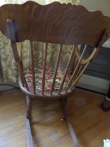 ANTIQUE OAK ROCKER CHAIR WITH UPHOLSTERED SEAT AND BACK. NEEDLE POINT FOOT STOOL,  LARGE RAG DOLL