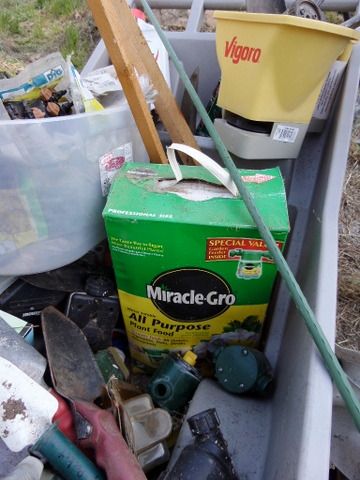 GARDENING SUPPLIES, LARGE BOX OF MIRACLE GROW, GARDENING CART AND TOTE, HAND TOOLS, TIMERS, AND MORE