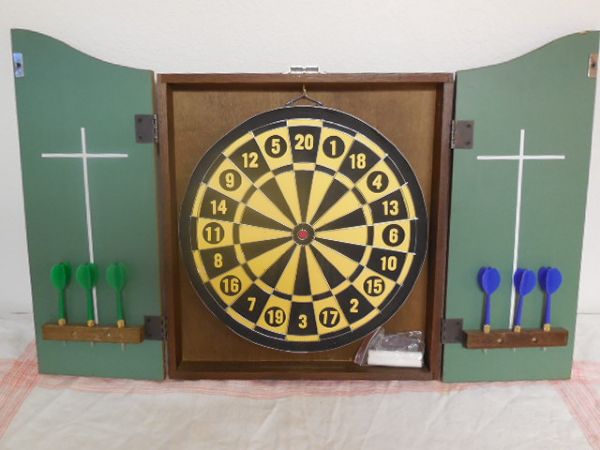 NEARLY NEW WALL MOUNT DART BOARD IN CABINET