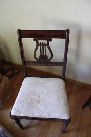 BEAUTIFUL AND STURDY ANTIQUE WOOD CHAIRS, MUSICAL EMBLEM BACK AND FOOT STOOLS