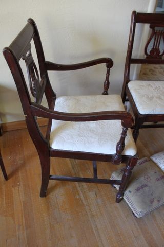 BEAUTIFUL AND STURDY ANTIQUE WOOD CHAIRS, MUSICAL EMBLEM BACK AND FOOT STOOLS