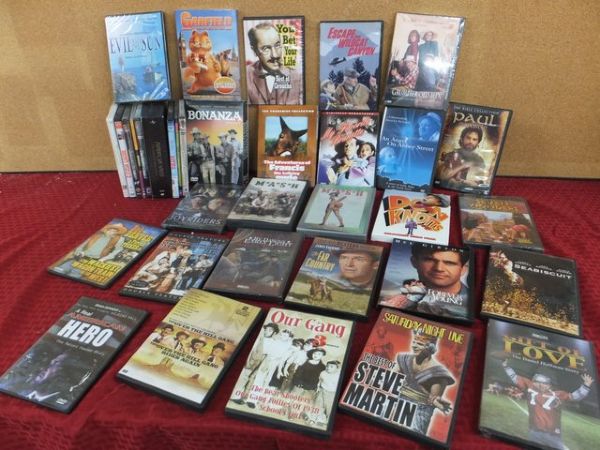 MORE THAN 35 DVDS MANY GENRES