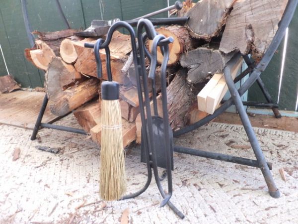 WROUGHT IRON ROUND FIREWOOD HOLDER, WITH FIRE TOOLS AND WOOD