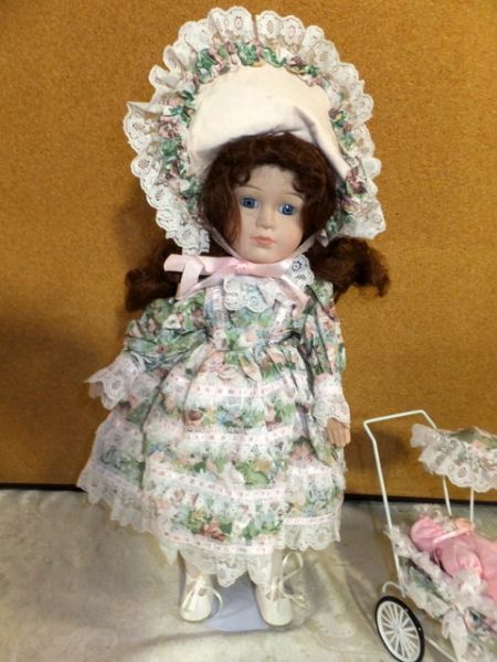 PRETTY  COLLECTIBLE  PORCELIAN/BISQUE DOLL WITH BABY IN PRAM