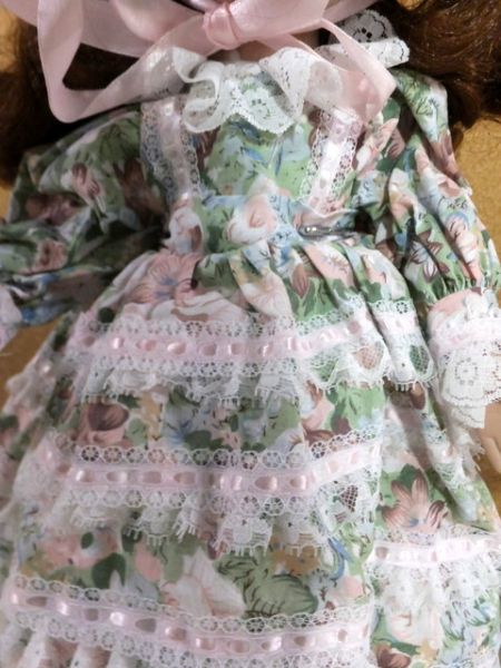 PRETTY  COLLECTIBLE  PORCELIAN/BISQUE DOLL WITH BABY IN PRAM