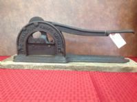 ANTIQUE TOBACCO PLUG CUTTER BY ENTERPRISE MFG. MOUNTED TO OLD BARN WOOD