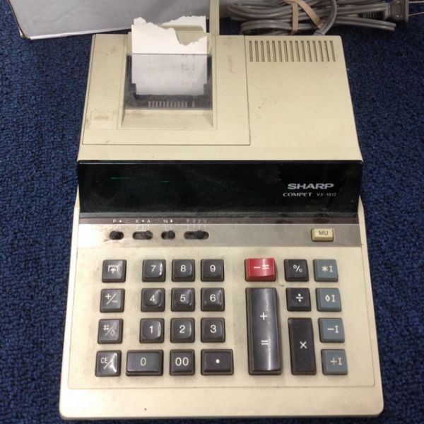 SHARP ADDING MACHINE & BOX OF TAPE ROLLS