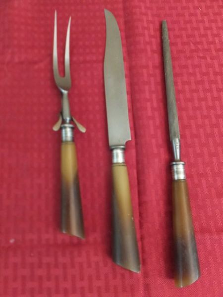 FABULOUS CARVING SET WITH BAKELITE HANDLES TRIMMED WITH STERLING SILVER