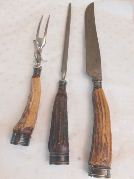 OLD ANTLER HANDLE CARVING SET WITH STERLING TRIM