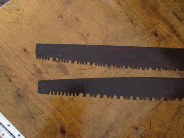 TWO  PRIMITIVE TWO MAN CROSSCUT SAW BLADES  WITH TWO HANDLES