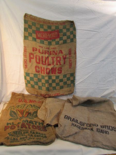 FOUR VINTAGE BURLAP SACKS